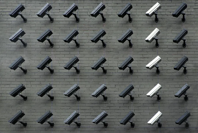 Dome security camera mounted on a building exterior
